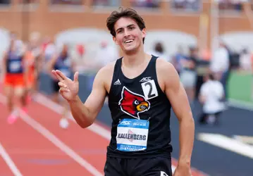 Paul Kallenberg throws the L up after winning the ACC decathlon title