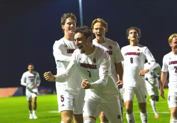 Braydon Sellers celebrates game-winner at Syracuse.