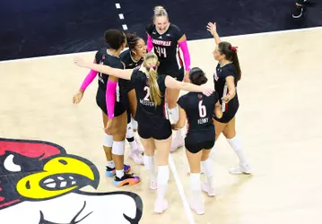 Louisville celebrates a point against Stanford