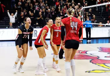 The Cardinals celebrate clinching the sweep over North Carolina