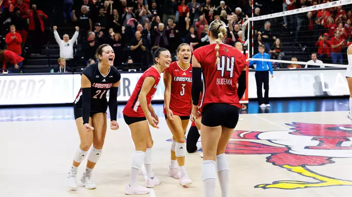 The Cardinals celebrate clinching the sweep over North Carolina