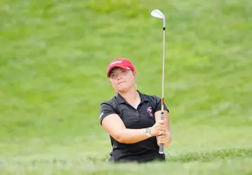 Bailey Burkett hits a chip shot