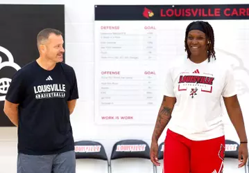 Amiya Joyner and Jeff Walz at practice