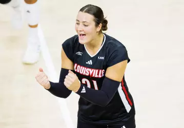 Payton Petersen celebrates a point in Louisville's win over TCU