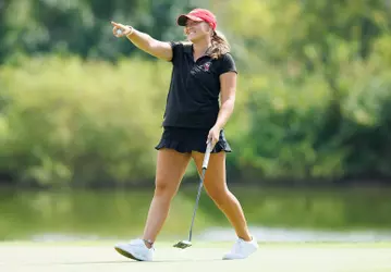 Bailey Burkett celebrates during a media day shoot