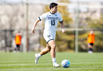 Ryan Quintos runs with the ball during the match against Lou City at the Lynn Family Sports Vision & Training Center on February 28.