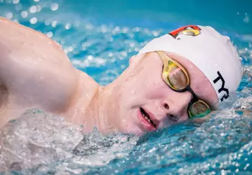 Nikita Sheremet swims the 50 free