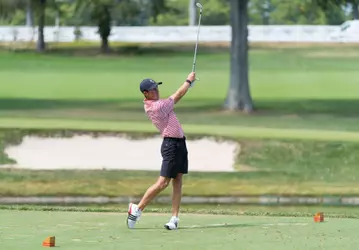 Warren Thomis hitting golf ball