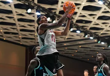 De'Shayne Montgomery goes up for a layup against Bahamas Raw Talent team in Baha Mar Hoops Summer League