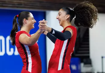Nayelis Cabello and Chloe Chicoine celebrate at spring match vs Kentucky