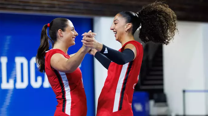 Nayelis Cabello and Chloe Chicoine celebrate at spring match vs Kentucky