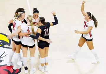 The Cards celebrate a point against TCU