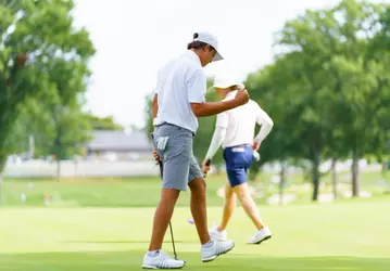 Barron Mundy celebrating a birdie putt.