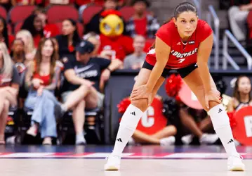 Chloe Chicoine prepares to receive a serve against Missouri