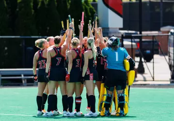 Field hockey huddle vs. Miami (Ohio)