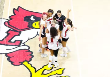 Louisville celebrates a point against TCU