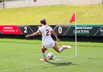Betsy Huckaby taking corner kick