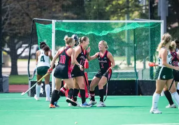 Louisville celebrates Chloe Plumb's goal at Michigan State