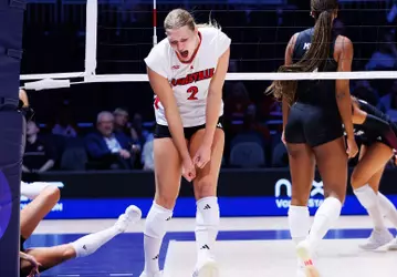Chloe Meester celebrates a kill against Texas A&M