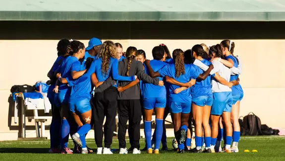 UCLA team huddle