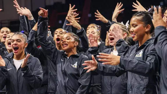 UCLA celebrates after placing first in the NCAA Corvallis Regional second round