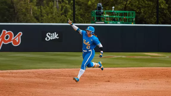 Megan Grant rounds the bases after her NCAA-record 38th home run