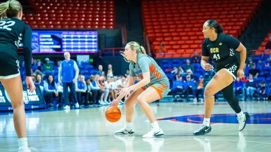 Mason Borcherding dribbles the ball against UC Riverside