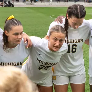 Women's Soccer Group Huddle