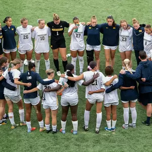 Women's Soccer Team Huddle