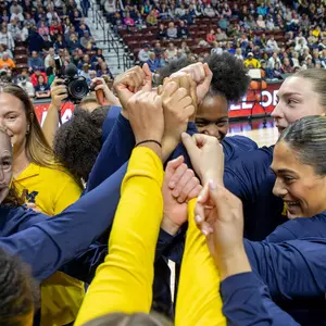 Women's basketball pregame huddle