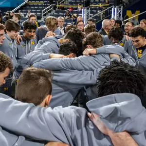 Michigan Men's Gymnastics Big Ten Event Finals huddle