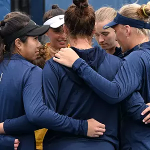 Women's tennis team huddle