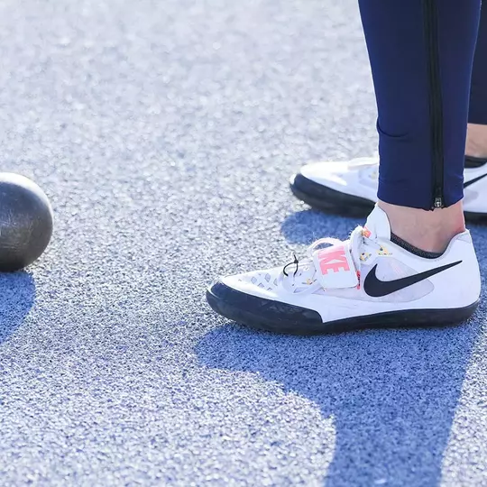 Track and Field Shot Put and Shoes