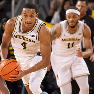 Nimari Burnett, foreground, and Roddy Gayle Jr.