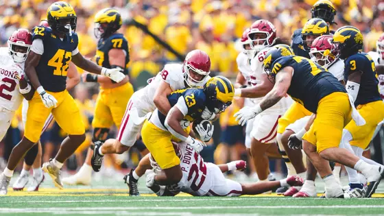 Owen Heinecke makes a tackle during the game against Michigan