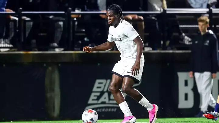 Mayowa Ajayi in action vs Akron