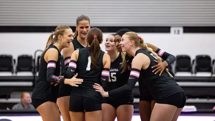 Volleyball vs. Seton Hall group huddle after scoring a point