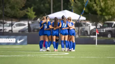 women's soccer huddle