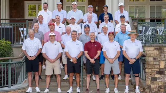 Twenty-four current and former collegiate head football coaches paired up to compete in the 2025 Southern Company Peach Bowl Challenge charity golf tournament on Tuesday at the Reynolds Lake Oconee resort outside Atlanta. Played annually since 2007, the event has generated more than $10 million in scholarship and charity. Row 1 (L to R): Gus Malzahn, Kirby Smart, Urban Meyer, Mike Norvell, Shane Beamer, Houston Nutt. Row 2 (L to R): Scott Satterfield, Dan Mullen, Jim Grobe, Kyle Whittingham, Steve Spurrier, Hugh Freeze. Row 3 (L to R): Rick Neuheisel, Pat Narduzzi, P.J. Fleck, Tom O'Brien, Derek Dooley, Jeff Monken. Row 4 (L to R): Dan Lanning, Randy Edsall, Brent Key, Chan Gailey, Manny Diaz, Paul Johnson.