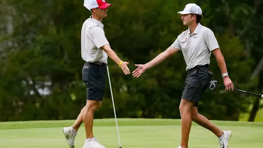 Georgia assistant coach Mookie DeMoss, Georgia golfer James Earle during the Athens regional of the 2026 NCAA Divison I Men's Golf Championship at the UGA Golf Course in Athens, Ga., on Wednesday, May 20, 2026. (Tony Walsh/UGAAA)