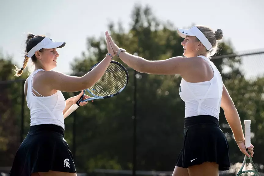 Issey Purser and Nina Plihal High-five