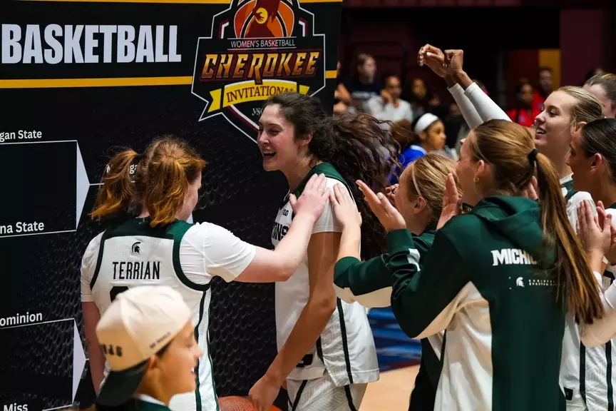 Emma Shumate celebrates at Cherokee Invitational