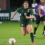 Kayla Briggs goes to goal in a game against Nebraska