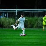 Conner O'Keefe strikes the ball.