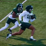 Michigan State's Keshawn Williams and Zion Gist go through a drill during spring practice in March 2026.
