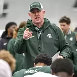 Michigan State head football coach Pat Fitzgerald addresses the team following the 2026 spring showcase in Spartan Stadium.