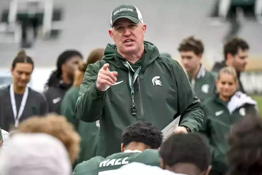 Michigan State head football coach Pat Fitzgerald addresses the team following the 2026 spring showcase in Spartan Stadium.