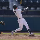 CJ Deckinga action swinging.