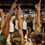 Gymnastics group huddle at NCAA Tempe Regional
