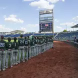 2025 MSU Baseball Team during the National Anthem before 2025 Big Ten Tournament game in Omaha.
